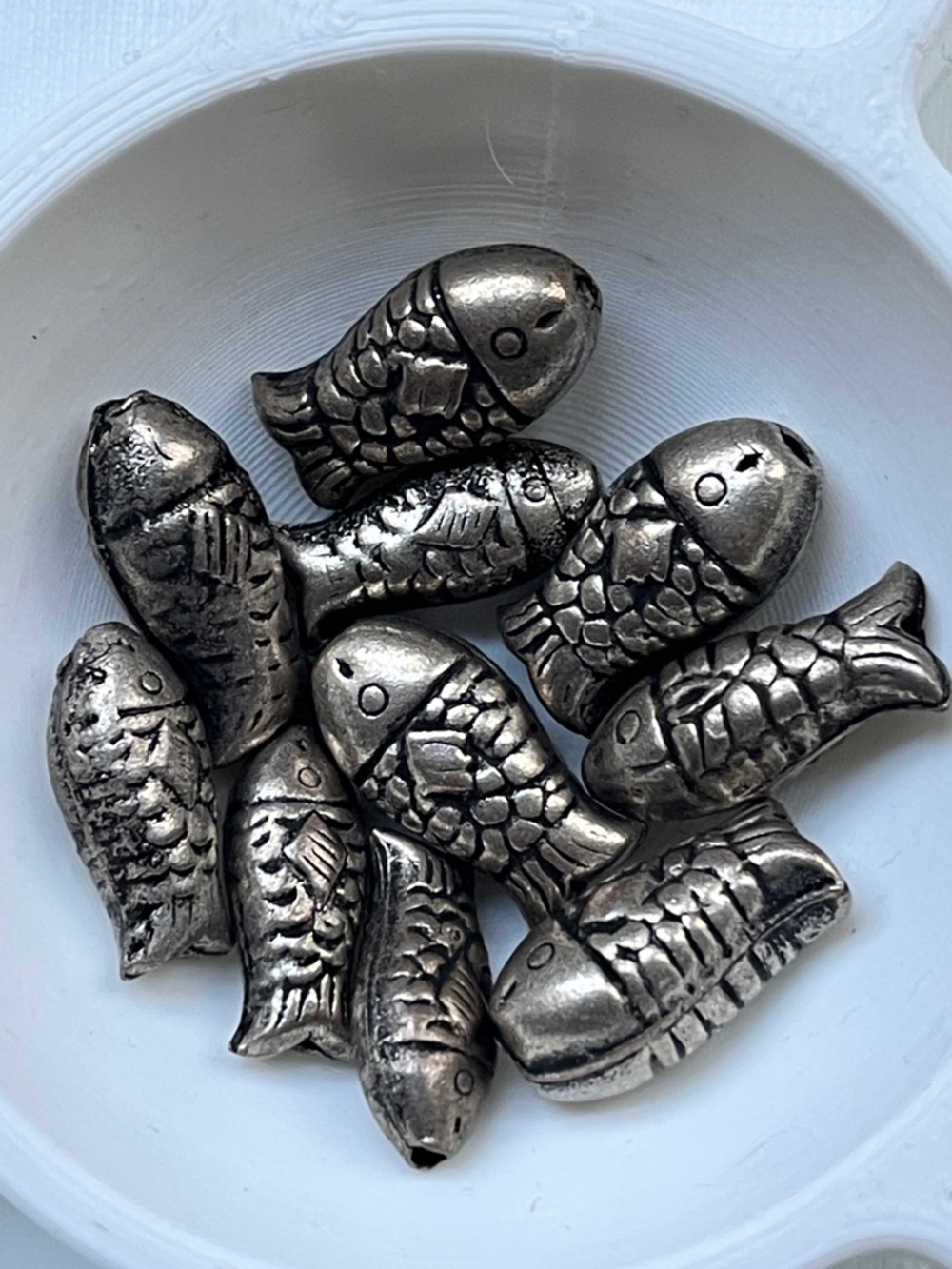 Vintage metal fish beads from India